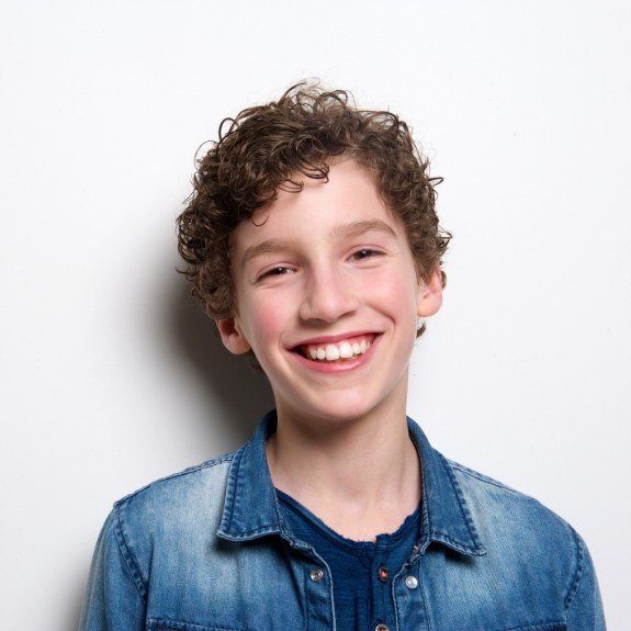 Young dental patient smiling after childrens dentistry visit