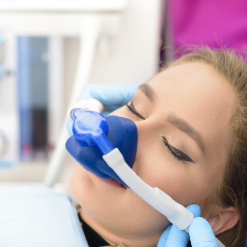 Dental patient relaxing under nitrous oxide dental sedation