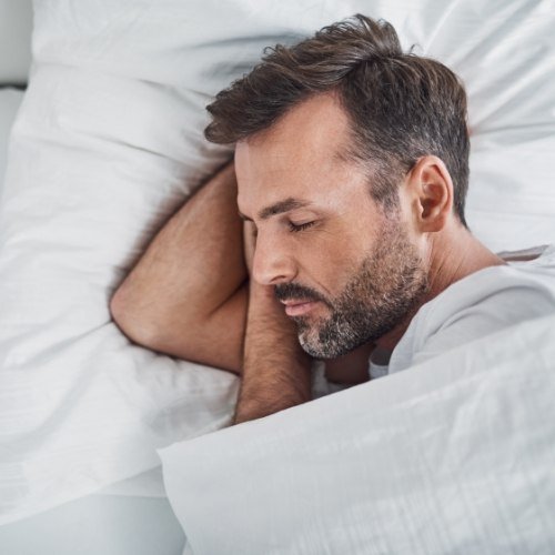Man sleeping soundly on his side